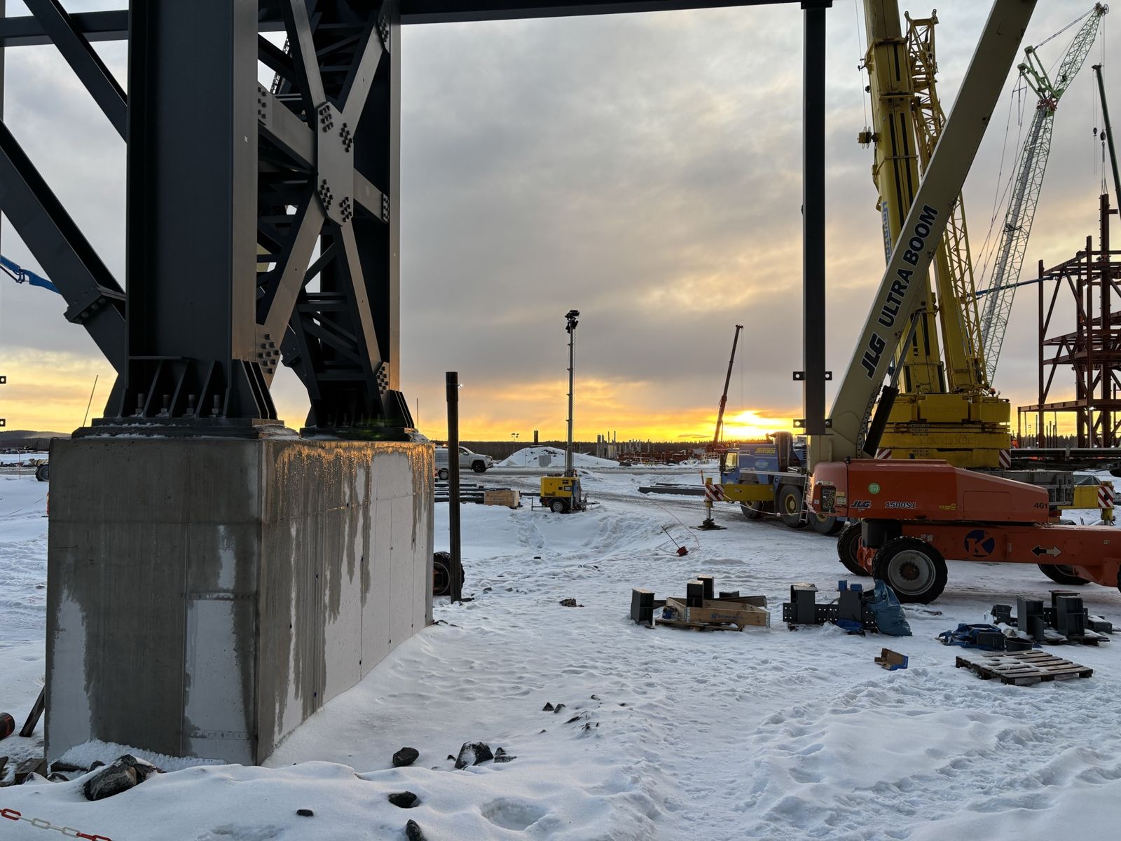 Steel column at the Stegra Boden green steel plant at sunset